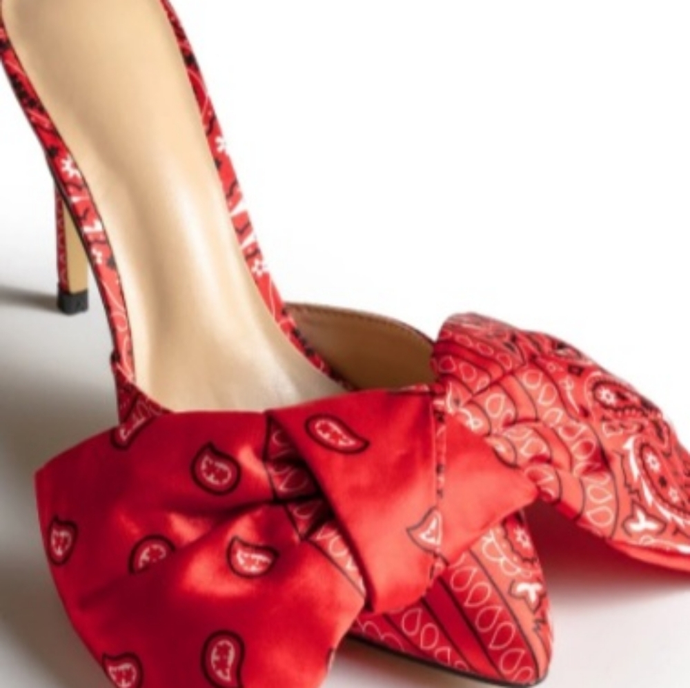 Iconic red paisley bow heels mules